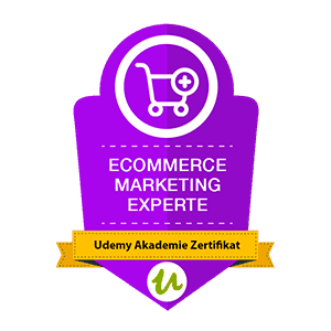 Lilafarbenes Abzeichen mit einem Einkaufswagensymbol, beschriftet mit „Ecommerce Marketing Experte“ und „Udemy Akademie Zertifikat“.